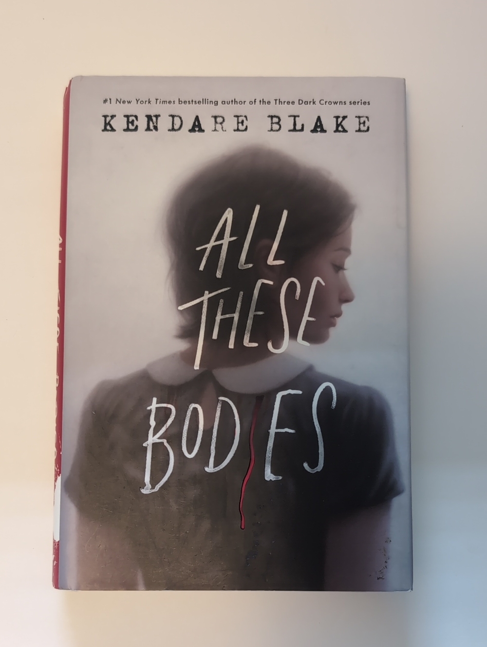 All These Bodies by Kendare Blake - Hardcover Book - Gray & Red Cover